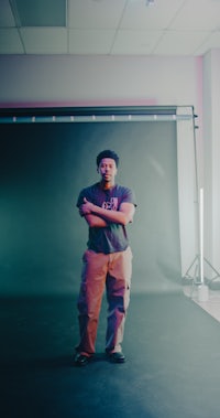 a man standing in a studio